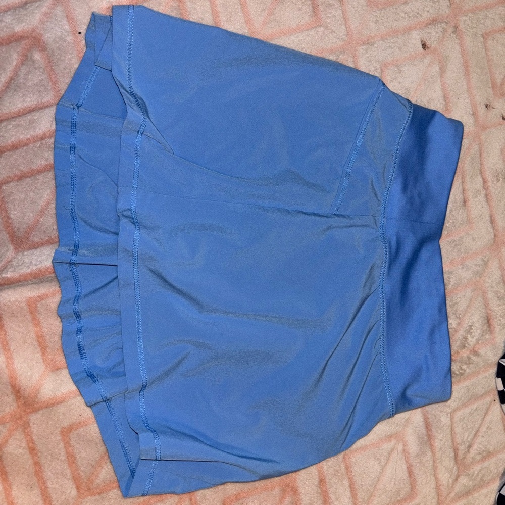 Athletic skirt with built in spandex. Small pocket in the back.
